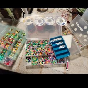Beads 4 containers and 4 spools of string